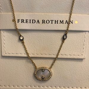 Gold and mother of pearl Freida Rothman necklace